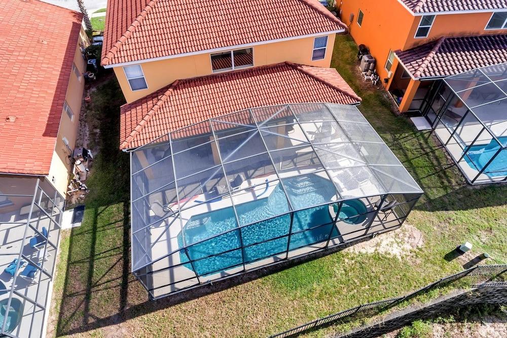 6 Br Pool Home with Spa and Game Room Aerial View