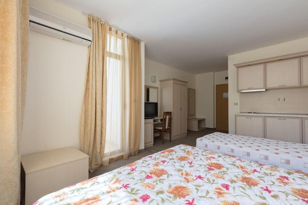 Studio with Balcony & Pool View Room