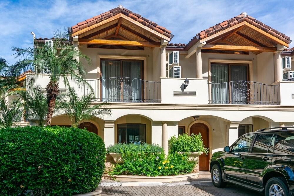 Modern Oceanfront Condo with a Chic Coastal Design, Resort-Style Amenities, and Direct Beach Access Exterior