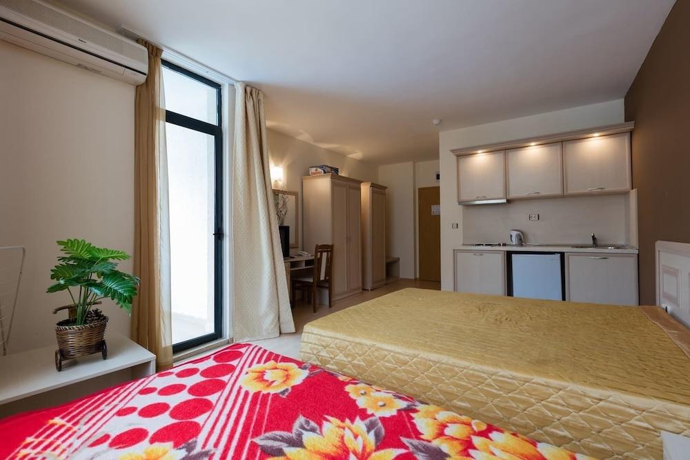 Studio with Balcony & Pool View Featured Image