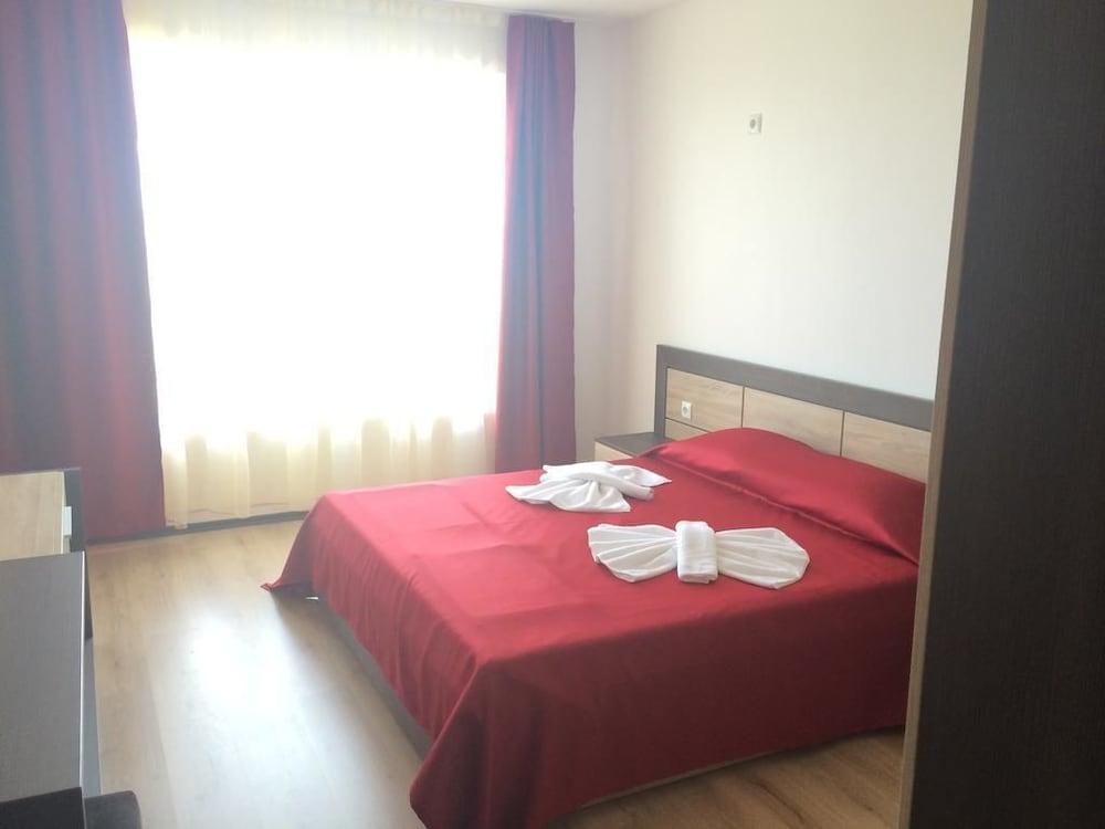 صن رايز أبارتمنتس باي انتر هوتل بوموري غرفة