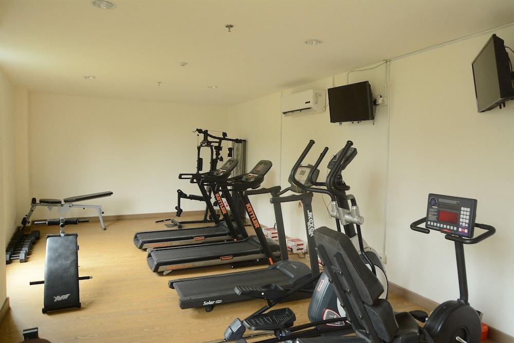 Clean and Tidy Studio Room at Tree Park Apartment Fitness Facility