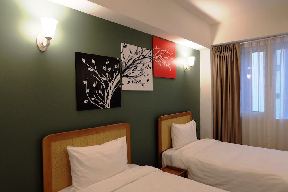 كوزي آت ناين هوتل آند كيتشن غرفة