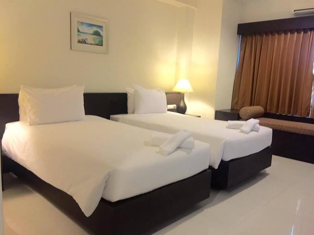 ذا وايت بيرل هوتل غرفة