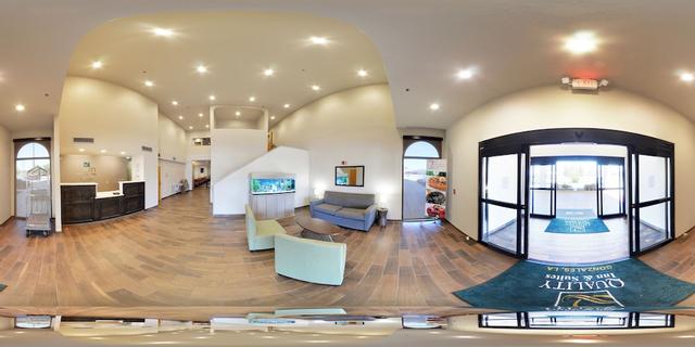 كواليتي إن آند سويتس نير تانجر أوتليت مول